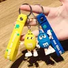 Chaveiros Boneca de feijão de chocolate pingente de desenhos animados Chaveiro casal KEYCHAIN PRESENTE joias masculinas e femininas mochila escolar Pingente