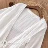 Johnature Women White Shirts Chinese Style Belt Blouses V-Neck Seven Sleeve Autumn Cotton Women Tops Casual Long Shirts 210521