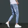 Heren jeans groothandel 2021 gescheurde enkel lengte kleine voeten Koreaanse stijl trend jeugd stretch casual potlood broek mannen