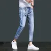 Heren jeans groothandel 2021 gescheurde enkel lengte kleine voeten Koreaanse stijl trend jeugd stretch casual potlood broek mannen