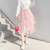 Jupes Femmes vêtements 2021 Fashion printemps haute taille élastique Mesh tutu jupe irrégulière longue goutte d'arrivée