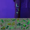 BAMBINI Luminoso tatuaggi temporanei Glow Dinosaur Adesivi animali per bambini Impermeabile Tatuaggio Falso Tatuaggio Ragazzi Ragazze Decorazione di compleanno Decorazione del partito Forniture
