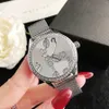 Relojes de marca Mujer Muchacha Cristal Estilo en forma de corazón Banda de metal de acero Reloj de pulsera de cuarzo GS 49
