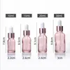 Cherry Pink Glass Essential Oil Butelka na perfumy Płynny odczynnik Pipeta Butelki z zakraplaczem z różowego złota Czapka 10-50ml