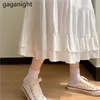 Zwart wit mode koreaanse ruche Midi A-lijn rok vrouwen casual lente zomer hoge taille All-match lange rokken femme 210601