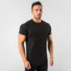 Été plaine hauts t-shirts Fitness hommes t-shirt à manches courtes Muscle Joggers musculation t-shirt mâle vêtements de sport coupe ajustée mode