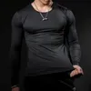 Hombre de manga larga Fitness T Shirts Entrenamiento Ropa de entrenamiento Primavera Cuello redondo Camiseta Hombres Color sólido Secado rápido Deportes Top Top Gimnasio Camisetas