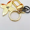 Lyxdesigner Keychain Letter Följ Pendant Gold Key Buckle Trendy Classic Keychains Mens Womens Högkvalitativa väskor Ornament925201y