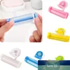 Spremiagrumi multifunzione a ventosa Spremiagrumi a parete Tubo di rotolamento in plastica a parete Spremiagrumi manuale Detergente per il viso Dispenser di dentifricio Prezzo di fabbrica design esperto