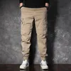 Pantaloni da uomo Cargo Spring Multi-tasche larghi Nove minuti Trendy Brand Street Casual Sports Khaki Military Green