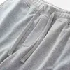 Super wysokiej jakości dekoracja patch męska i damska spodenki sportowe, bawełniane spodnie pięciopunktowe H1210