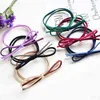 Hele 50-150pcs schattige strik elastische effen kleur ring hoofdtooi vrouwen paardenstaart rubberen band haaraccessoires