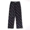 Pantaloni con stampa Cartoon Pantaloni grigi Uomo Donna Pantaloni VTM 1: 1 di alta qualità con numerosi logo leggermente oversize