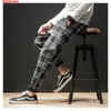 Dropshipping Giapponese Streerwear Degli Uomini Pantaloni A Quadri 2020 di Modo di Autunno Uomo Sottile Pantaloni Casual Coreano Pantaloni Harem Maschili Y0811