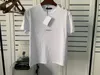 T Shirts de las mujeres de los hombres Camisetas casuales de alta calidad de la moda de la letra de la carta de algodón de la manera en blanco y negro botones botones Hip Hop Ropa para hombres y mujeres