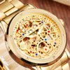 Hommes Regardez des montres de squelette mécanique automatiques dorées 2021 Bracelet de bracelet d'horloge auto-remuant