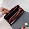 2021 Couro simples europeu e americano 20% de desconto Money Clips Clutch Lychee Pattern Moda Banquete Long Wallet Feminino Alta Qualidade Entrega Rápida