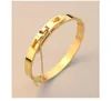 Hot Sell 316l Rostfritt stål Guld Silverpläterad Bangles Armband för Lover Trendiga Smycken För Kvinnor Män Q0717