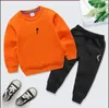 0-11 Jahre Kinderbekleidungssets BABY Jungen Mädchen Kleidungsstück Herbst Winter Muster Designer Pullover Anzug Kinder Mantel + Hose