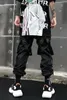 Pantalon pour hommes Streetwear pavé de survêtement des hommes HIP HOP Punk Cargo pour les rubans noirs masculins Harem Harajuku Pantalon de mode japonais