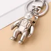 Moda Şık Lüks Tasarımcı Keychain Klasik Anahtar Toka Astronot Kolyesi Mat Gümüş Anahtarlıklar Erkek Kadın Çanta Çanta 8816806