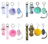 7 Färger Fashion Defense Keychains Set Pompom Alarm Keychain Lipstick Holder and Admband för kvinnliga män självförsvar Keyring