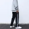 Sida randig patchwork svett byxor hajuku mens kvinnor velour jogger sweatpant high street man fashion velvet bredben byxor män