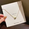 Acacia bean pendant necklace sweet and cool female personality light luxury