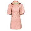 Robe en cuir PU rose deux pièces sexy femmes manches châle bouton chaîne moulante club fête mini robes mode 210527