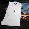 Pantalones vaqueros ajustados elásticos para hombre, pantalones vaqueros ajustados informales a la moda, pantalones blancos, ropa de marca masculina, negocios para Chinos Men's2316