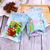 100 unids / lote Bolsa de Aluminio Bolsas de Embalaje de Plástico Cremallera Holográfica Bolsa de Almacenamiento Resellable con Agujero Colgante para Alimentos Snack