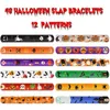 Bracelets à breloques 48pcs Slap Party Favors avec des bandes colorées d'impression d'Halloween pour enfants