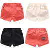 Moda de verano 2 3 4 6 8 10 años 90 100 110-140 cm Deportes de algodón Color sólido Pantalones cortos elásticos guapos para niños Baby Boy 210529