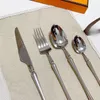 Luxury designer fashion label knife, fork and spoon set 4 pieces 1 set of top 304 stainless steel material use for home hotel restaurants party dinner festival gift new