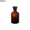 60/125/250 / 500mlラボ用品茶色の琥珀色のガラスの詰め替えボトル携帯用瓶試薬コンテナーストッパー