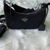 مصممين عالي الجودة Women Handbag Presct Cack One كتف رسول السلسلة الجلدية حقيبة ظهر القماش 2776013