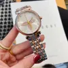 Marque Regarde des femmes girl Flower Style Metal Steel Band Quartz Wrist Watch L42289E3184579