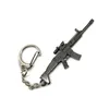 Keychains 50pcs / Lot Chaînes de clé Jeu 20 Styles Pubg CS Go Gun modèle 98K Sniper Rifle Chaîne Anneau pour hommes Cadeaux