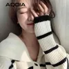 冬の韓国風の黒い白い縞模様の女性のセーターを折りたたみボタンアップニット女性のセーターの女性カーディガン210521