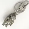 Högkvalitativ solid metallnyckelkedja varumärke hänge objekt titan stål astronaut bil nyckelring presentförpackning216y