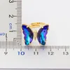 Design de mode magnifique papillon anneau doux 10 couleurs cristal Transparent anneaux réglables pour les femmes groupe de bijoux de fête