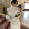 Casual Dresses Autumn And Winter Women's Sexy Tight Dress European American Fashion Solid Color High Neck Soft Sweater Long Skirt