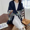 Женщины Геометрия вязаный кардиган свитер глубокий V-образным вырезом джемпер кнопка все-матч женский шикарный корейский свободные вершины осень зима 211011