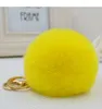 Pompom Women Trinkets Leather Bow c Charm Pompon Keyring Fluffy Faux Fur Ball Key Chains For Car Bag 2021