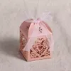 Caja de papel de regalo Corazón cortado con láser Cajas de favores huecos Regalos Titulares de dulces con cinta Suministros para banquetes de boda RH3616