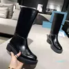 Hochwertige Luxus-Designer-Stiefel für Damen, Metallknopf-Kettenschuhe, Leder, niedrige Absätze, gerade Winterstiefel