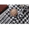 Höstkvinnor förtjockar Fashion Elegant Soft Tie Plaid Fringe Decoration Button Mini kjol 2021 Kvinnors kjolar