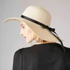 2020 nouveau chapeau de paille femme été grand chapeau de plage à large bord chapeau de plage en plein air version coréenne du chapeau de soleil sauvage pliable anti-UV G220301