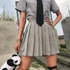 Japanska sommar kvinnor kjolar koreanska hög midja ren färg mini kawaii skola tjejer sexig söt blixtlås pläterad 210608