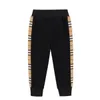 Barnbyxor Vår Höstflickor Sportbyxor 2022 Nya Sweatpants Striped Casual Middle and Small Children Trouser